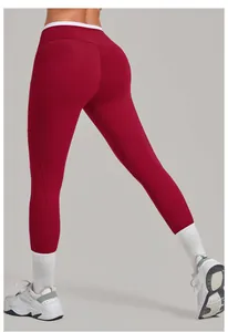 Détails du legging de yoga avec effet galbant, taille contrastée et poches latérales