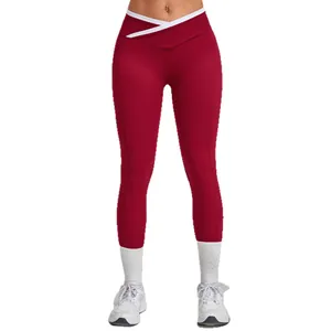 Leggings de yoga bordeaux à taille haute avec ceinture croisée en V et poches latérales