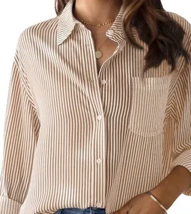 Detail of vertical brown and white stripes on a casual long-sleeved button-up shirt