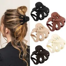 Set of five large matte hair claws in earth tones shown in use and product display