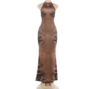 Detail of brown halter neck maxi dress with baroque print and silky satin finish