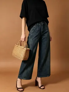Jeans a gamba larga a vita alta blu scuro lavato con eleganti cuciture frontali