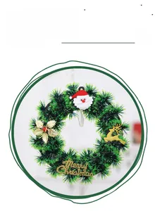 Detail of Christmas wreath with Santa Claus, golden reindeer and Merry Christmas sign