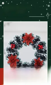 Detail of Christmas wreath with green pine needles, red glitter flowers and snowy berries