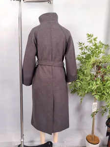 Back view of a long dark taupe coat with a high stand collar and matching waist belt