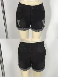 Detailed front and back view of high waist black distressed denim shorts for women
