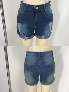 Detailed front and back view of blue ripped denim shorts displayed on a mannequin