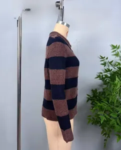 Side view of long-sleeved striped knit sweater with navy and burgundy horizontal bands