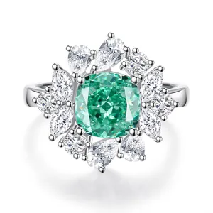 S925 silver ring featuring cushion-cut green gemstone with floral diamond cluster