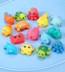 Flat lay of 14-piece colorful sea animal bath toys including starfish and dolphin figures