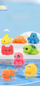 Set of 8 colorful rubber sea animal squeeze toys floating in a pool for baby bath time