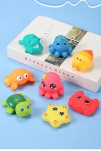 Colorful collection of cartoon ocean animal vinyl bath toys featuring starfish and turtle