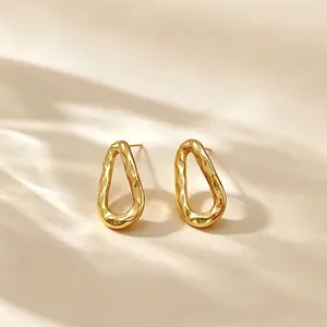 Elegant gold titanium steel geometric oval stud earrings with organic lava texture finish
