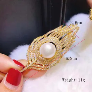 Detailed view of pearl feather brooch with 6.2cm size and 11g weight measurements
