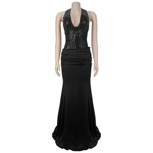 Close-up detail of a stunning black sequined halter neck mermaid evening gown for women