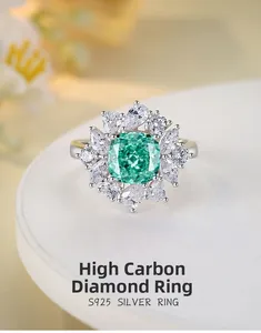 Detail of S925 silver ring featuring a green square high carbon diamond in flower design