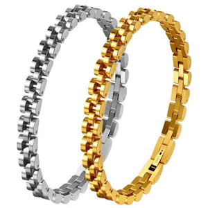Detail of men's hip hop watch band style bracelets in gold and silver titanium steel