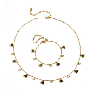 Gold-plated stainless steel heart necklace and bracelet jewelry set with crystals