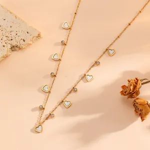Elegant 18K gold plated stainless steel necklace featuring shell heart charms and crystals