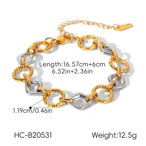 Detail view of gold and silver mixed color geometric stainless steel bracelet with dimensions