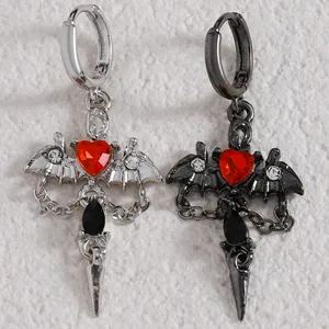 Gothic silver and black wing earrings with red heart gems and dagger charms