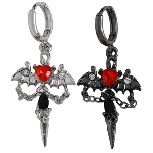 Gothic style hoop earrings featuring bat wings with red heart and dagger pendants