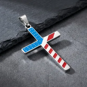 Detailed close-up view of a stainless steel American flag cross pendant with enamel finish
