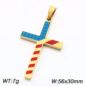 Detail view of a US flag-themed cross pendant with gold plating and blue/red enamel