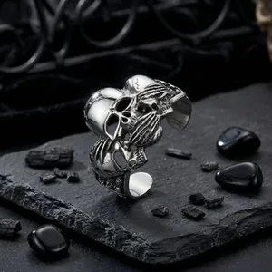 Macro detail of gothic skull bangle with vintage silver finish and intricate bone textures