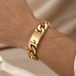 Close-up of a high-polished gold Cuban link bracelet for men with mechanical clasp