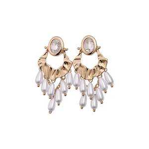 Vintage gold oval diamond stud earrings with elegant white teardrop pearl tassels