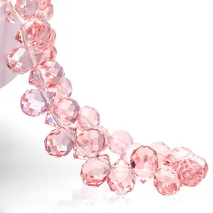 Macro shot of pink faceted K9 crystal beads showing clear texture and sparkle
