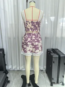 Detail view of the lace trim and shirred back on this floral summer two-piece set