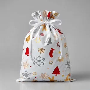 White Christmas gift bag with golden trees and red reindeer patterns and ribbon