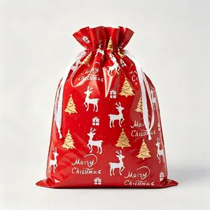 Red Christmas drawstring gift bag with metallic sheen featuring reindeer and tree patterns
