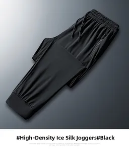 Detailansicht der schwarzen Eisseide-Jogginghose mit Reißverschlusstaschen und Kordelzug