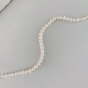 Close-up of elegant baroque freshwater pearl bracelet with natural luster and texture