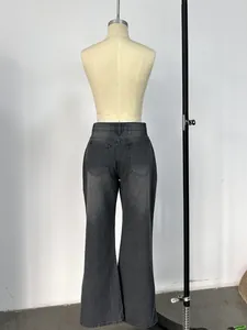 Rear view detail of high-waisted wide-leg jeans in washed dark grey with back pockets