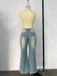 Detailed back view of high-waisted flared jeans showing pockets and light blue wash