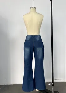 Back view of high-waist wide-leg jeans in dark blue wash with dual rear pockets
