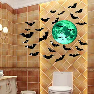 Détail de chauves-souris noires d'Halloween entourant une lune verte luminescente