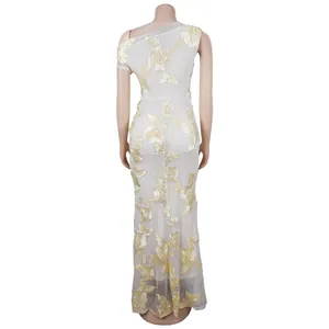 Detailed embroidery of gold floral lace on white mesh one-shoulder long dress
