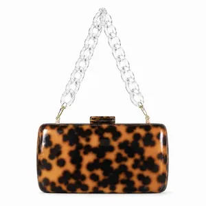 Vintage acrylic evening clutch bag with tortoise shell pattern and clear chain link strap