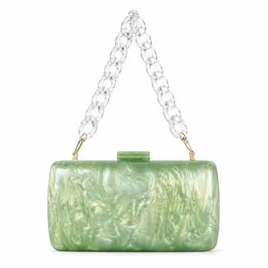Pale green marble acrylic clutch bag with a transparent chunky chain and gold hardware