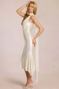 Detail of cream satin halter dress with long flowing sash and mermaid hemline