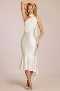 Detail of elegant one-shoulder satin dress featuring delicate chiffon layers in white
