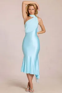 Detail of light blue satin halter dress showing elegant ruffles and asymmetric hemline