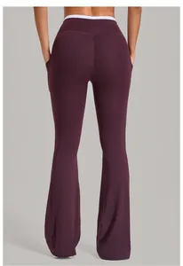 Detailed back view of purple flare yoga pants with pocket and contrasting waist detail