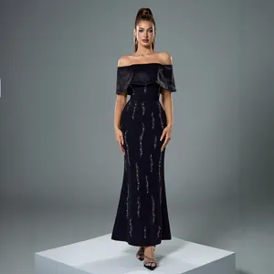 Elegant off-shoulder black evening gown with silver sequins and slim fit silhouette