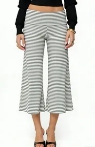 Detail of high-waisted grey striped culottes with wide-leg cut and soft knit fabric